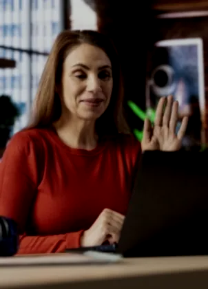 Organizer preparing an online class at a laptop