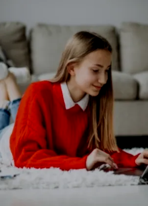 Student learning on a laptop at home