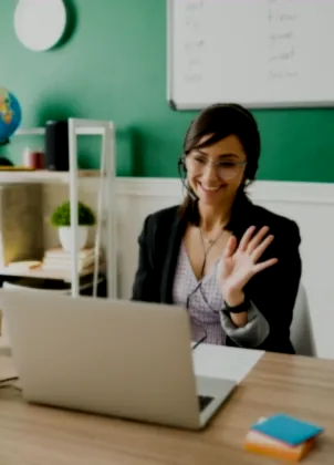 Teacher greeting an online class