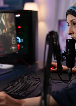 Streamer setting up at a computer
