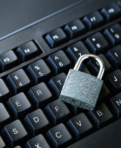 Padlock on a keyboard representing protected access