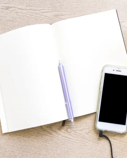 Calendar and notebook used to plan broadcast sessions