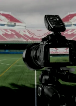 Camera set up beside a football pitch
