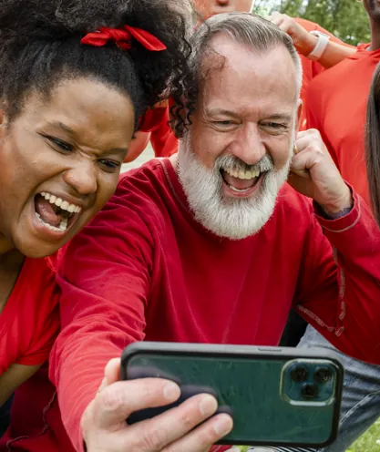 Supporters watching sports on a phone