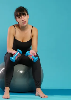 Fitness instructor recording in a studio
