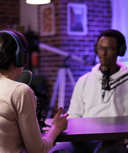 Host and guest in a podcast conversation
