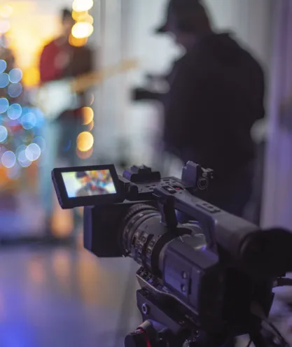 Video camera recording a live stage