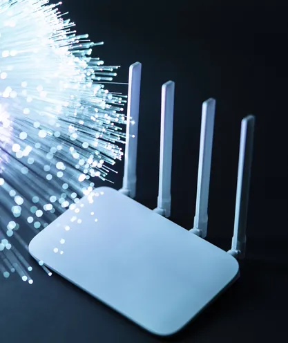 Wi-Fi router beside fiber connections