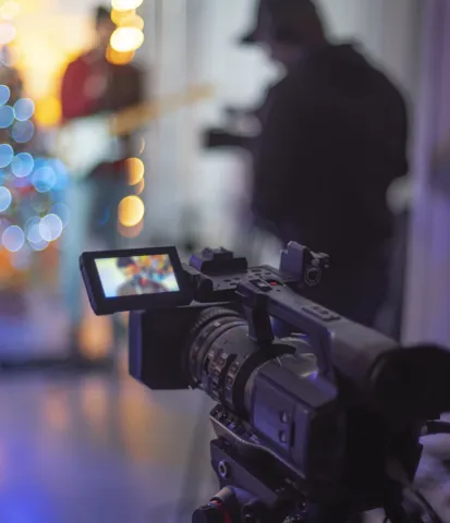 Camera operator filming a live event