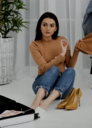 Host presenting clothing for an online shopping show