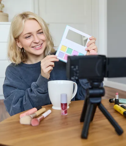 Creator presenting products to a camera