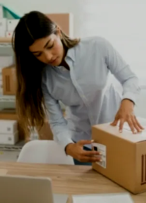 Shop owner preparing an online order for delivery