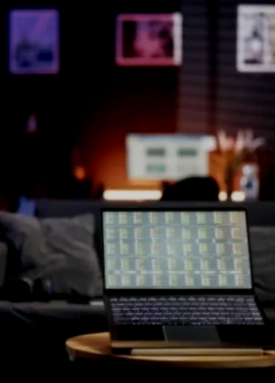 Laptop and microphone set up to connect the trading room stream