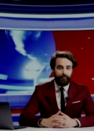News presenter at the studio desk