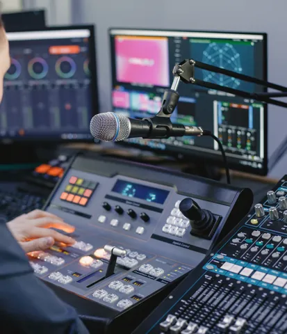 Production operator at a broadcast desk
