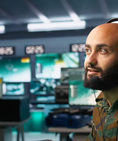Radio operator speaking into a studio microphone