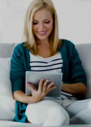 Client watching a coaching replay on a tablet