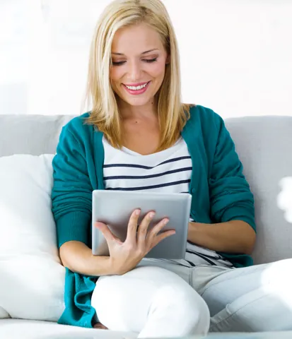 Viewer watching a recorded program on a tablet