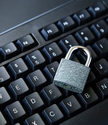 Padlock on a computer keyboard representing playback security