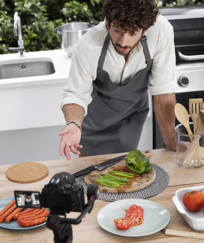 Cook recording a kitchen demonstration