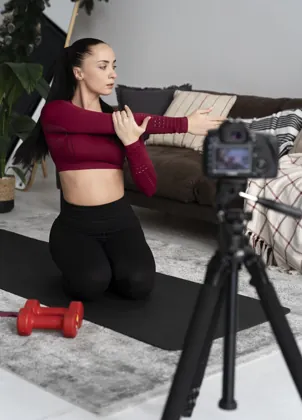 Instructor recording a fitness class
