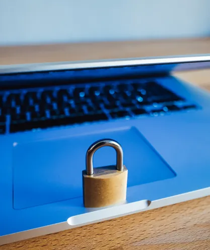 Padlock placed on a laptop for protected video access