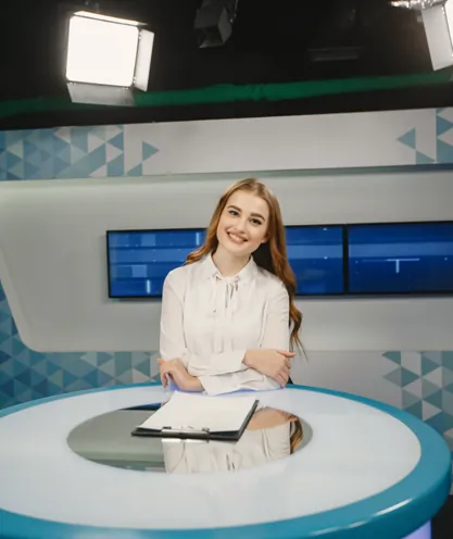 Presenter at a local news desk