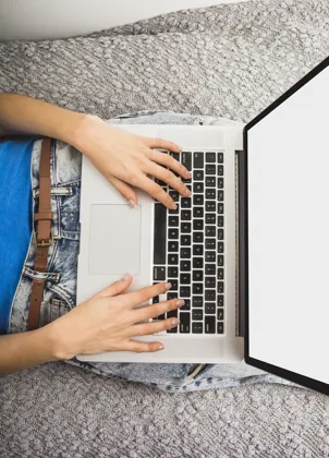 Hands using a laptop