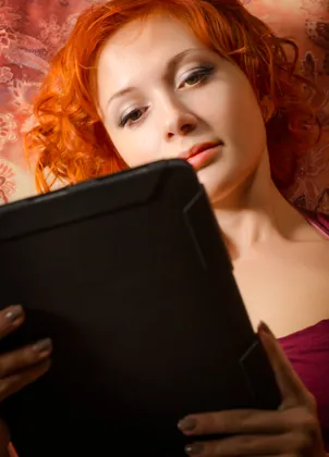 Viewer reading on a tablet